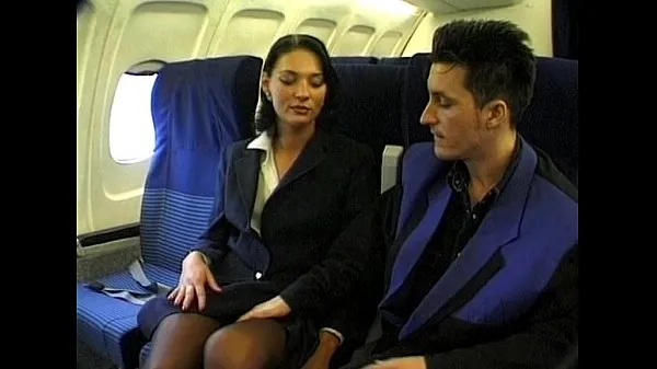 HD Brunette beauty wearing stewardess uniform gets fucked on a plane megaputki