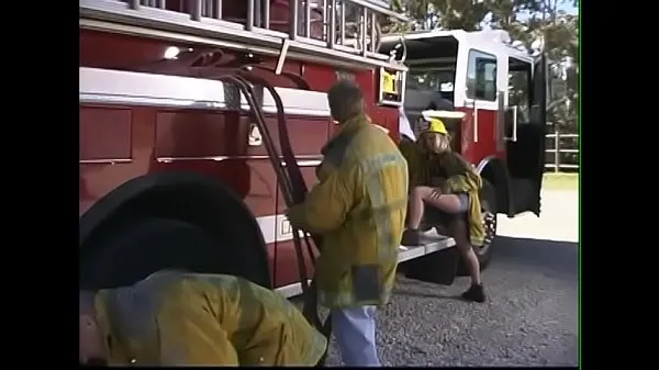 HD Starving blonde whore is serving the whole fire team right on the fire-truck mega Tube